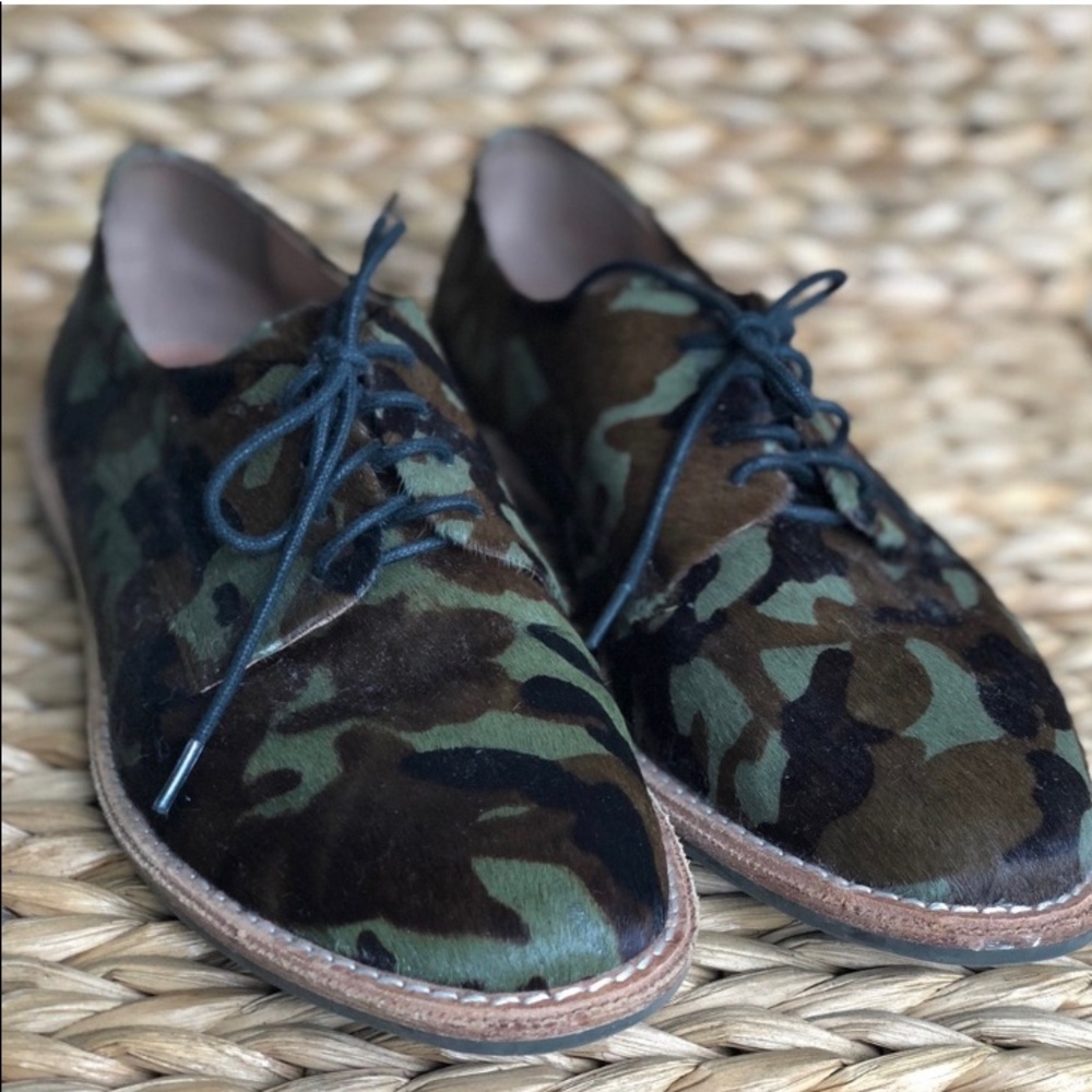 Vince Camuto camo calf hair loafers.